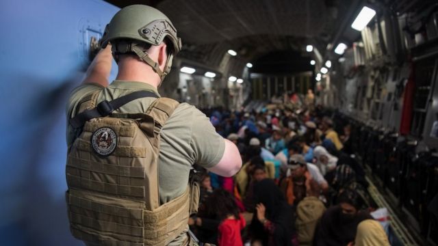 A US aircraft evacuating Afghans