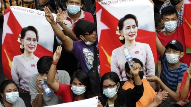 Demonstrators flash the three-finger salute in Yangon, Myanmar