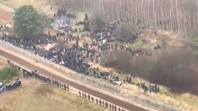 Footage showing hundreds of migrants gathering on the Belarusian side of the border on Monday